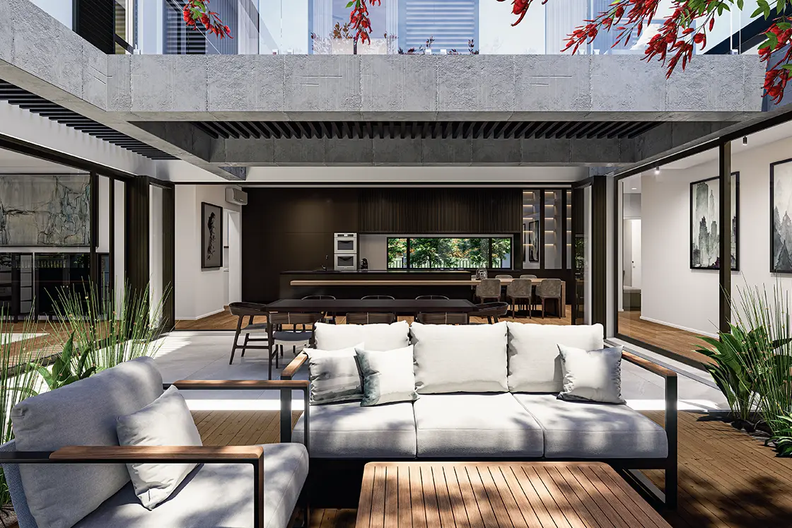 Perfect Hideaways property for sale: Open-air modern living space with a cozy couch, wooden flooring, and green plants. View into a sleek kitchen and dining area with natural light. Coral Tree House, Paarl.